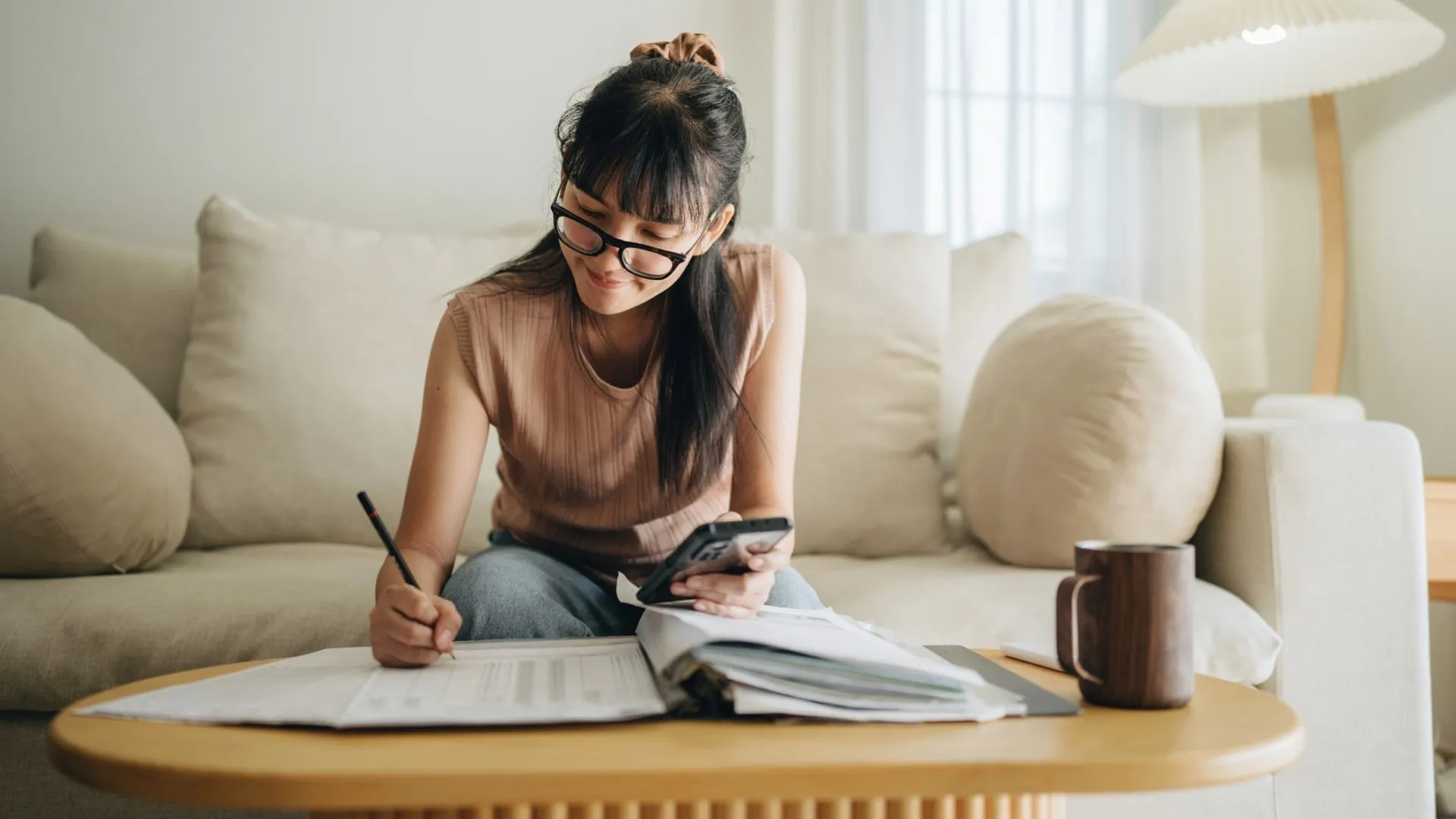 Woman writing in a notebook